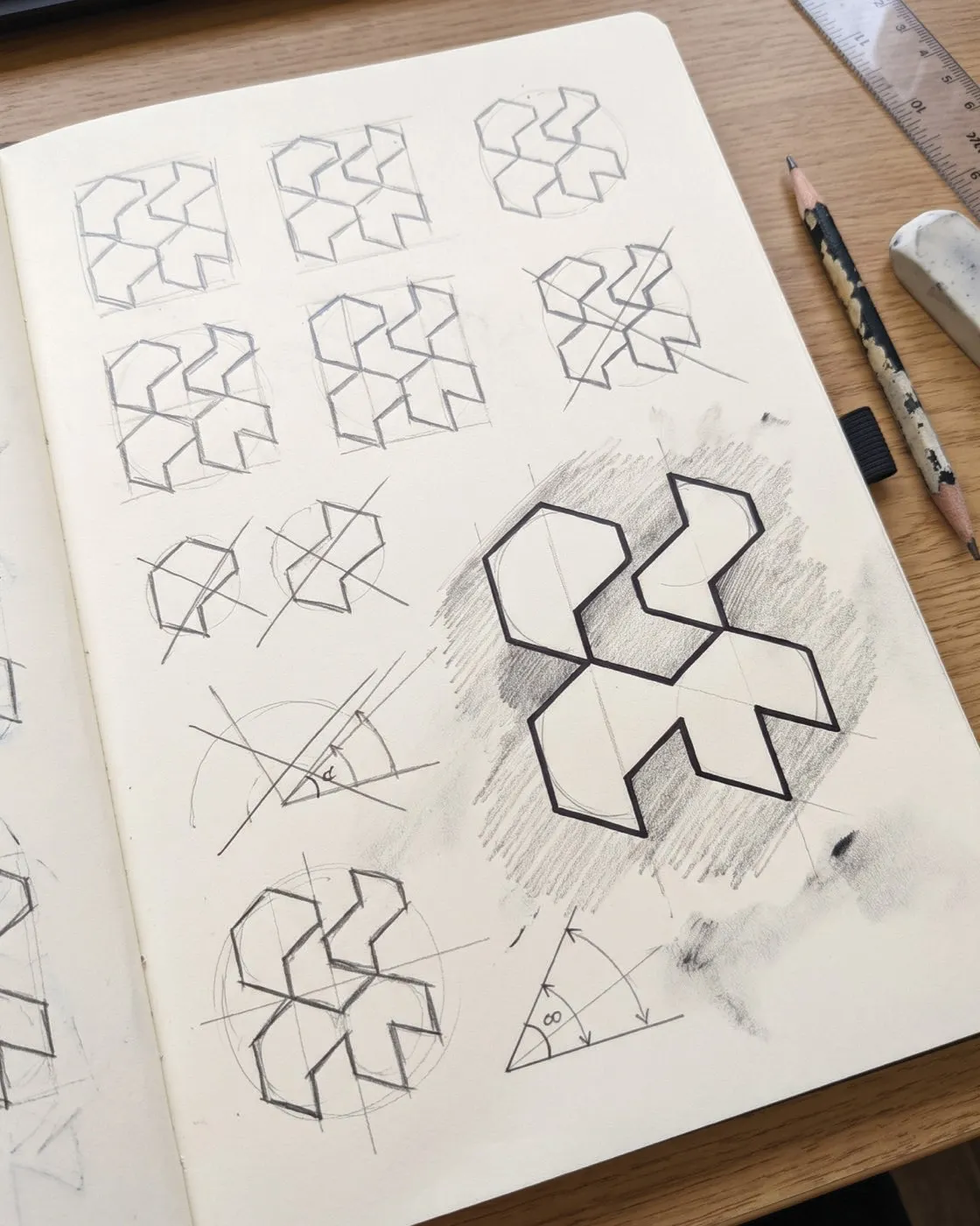 PSPR logo sketches in a notebook